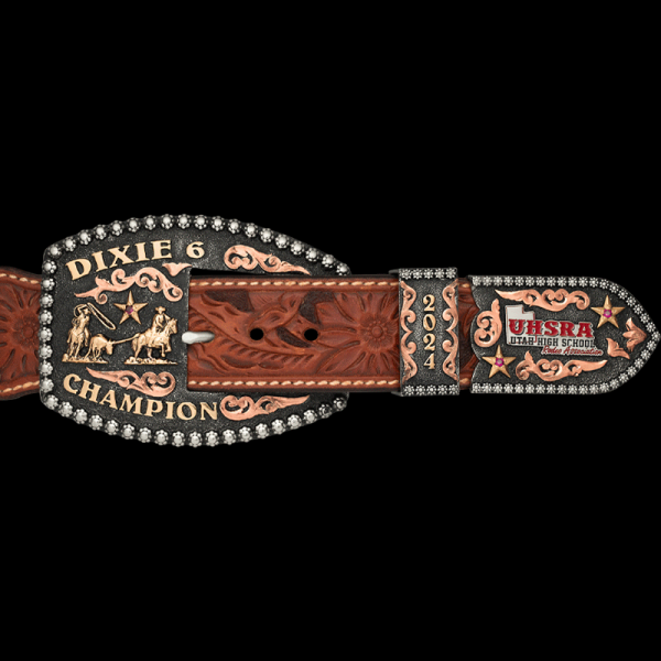 Let's hear a Yee-haw! for the Wilmington Three Buckle Set. This beautiful custom trophy buckle is perfect for any rodeo competition, western event or graduation. Features hand matted base, copper scrolls and our signature berry edge. Customize it now!