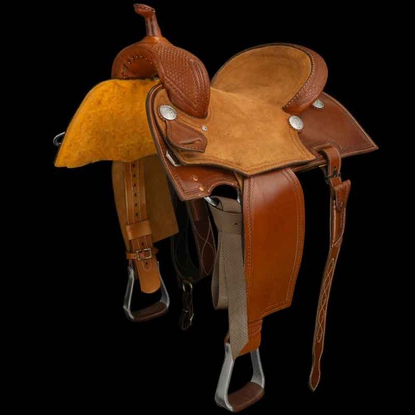 A full image of a rancher saddle with black background