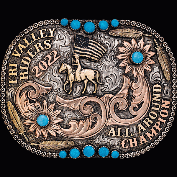 The Santa Cruz Belt Buckle is an antiqued german silver buckle with berry beads, copper scrollwork, bronze 2d feathers and 12 Turquoise stones. Customize it now!